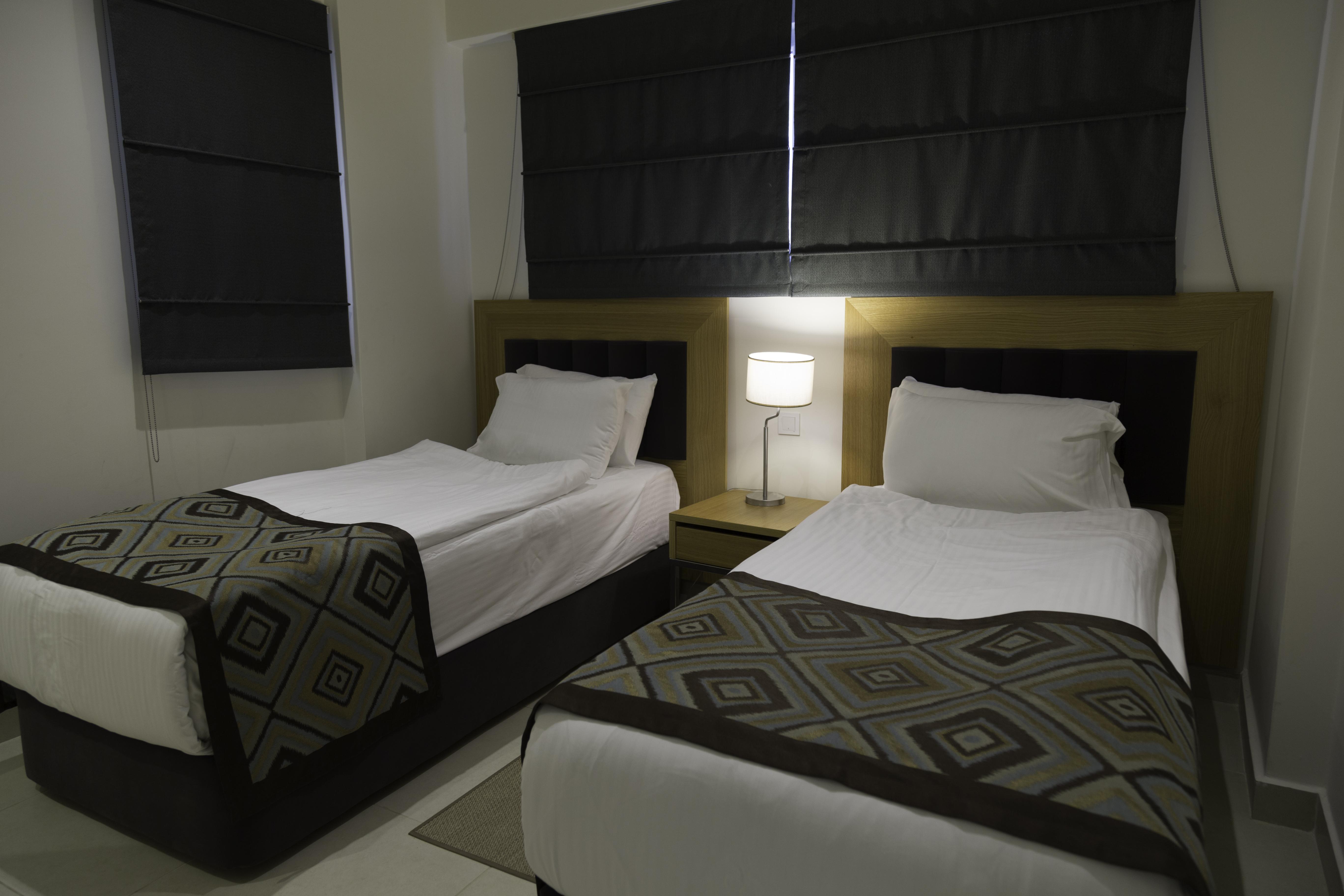 รามาดา รีสอร์ต บาย วินด์แฮม คูซาดาซิ Hotel คูซาดาซี ภายนอก รูปภาพ A bedroom at the hotel
